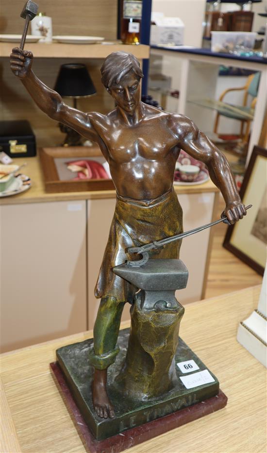 After Lemoyne. A bronzed spelter figure of a Blacksmith Le Travail height 57cm